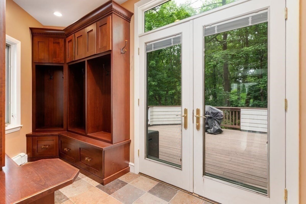 Traditional dining room remodel with view into sitting area, designed by Thomas Buckborough & Associates in Acton, MA